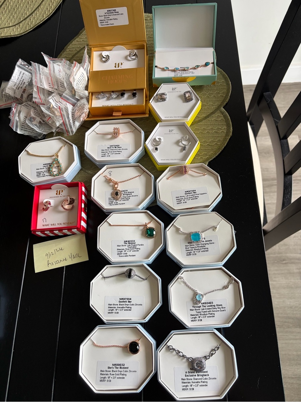 25 rings with tags/bags- 1 jewel candy-3 earrings- 10 OG necklaces- 1 CH